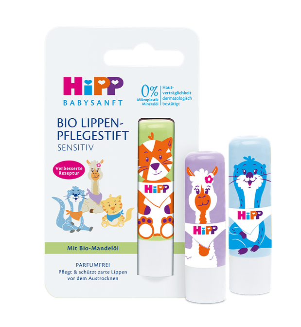 HiPP Baby Sanft lip balm set with three tubes of lip care and their retail packaging on a plain white background.