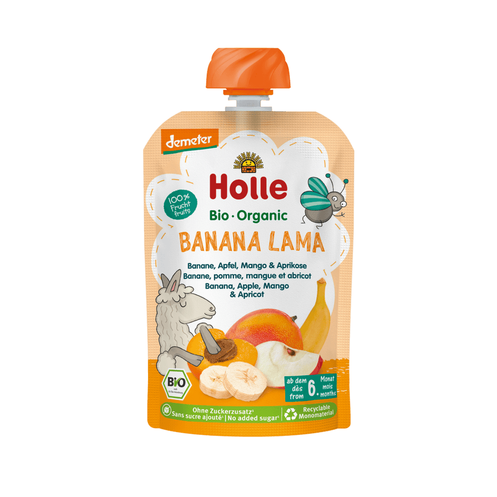 Holle organic banana lama baby food pouch on a black background
