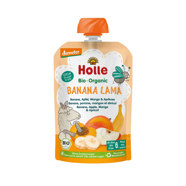 Holle organic banana lama baby food pouch on a black background